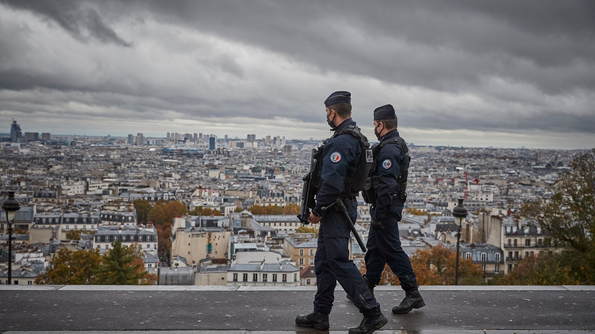 Armed French Police patrol in Paris on All Saints Day - Credit: Getty Images