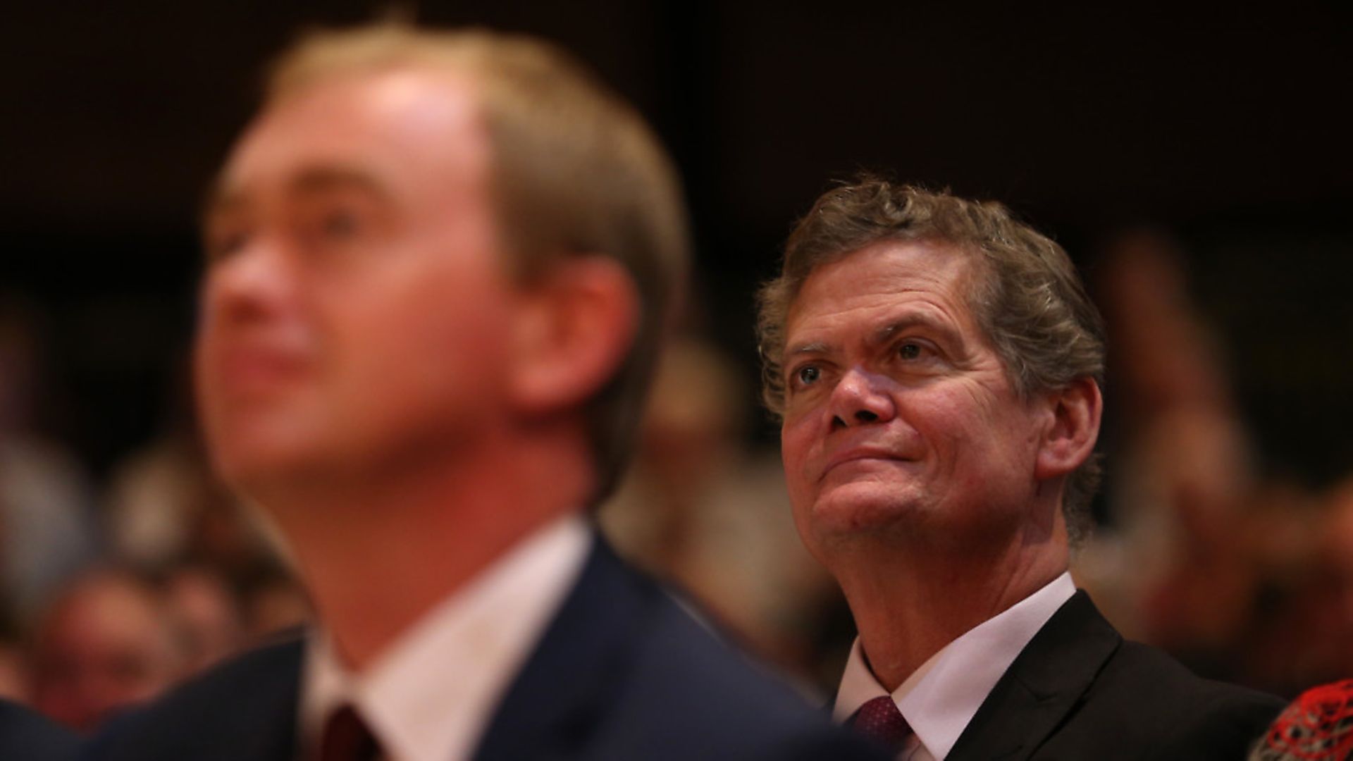 Stephen Lloyd MP (right) sits behind Tim Farron MP at Lib Dem conference. Photograph: Andrew Matthews/PA. - Credit: PA Archive/PA Images