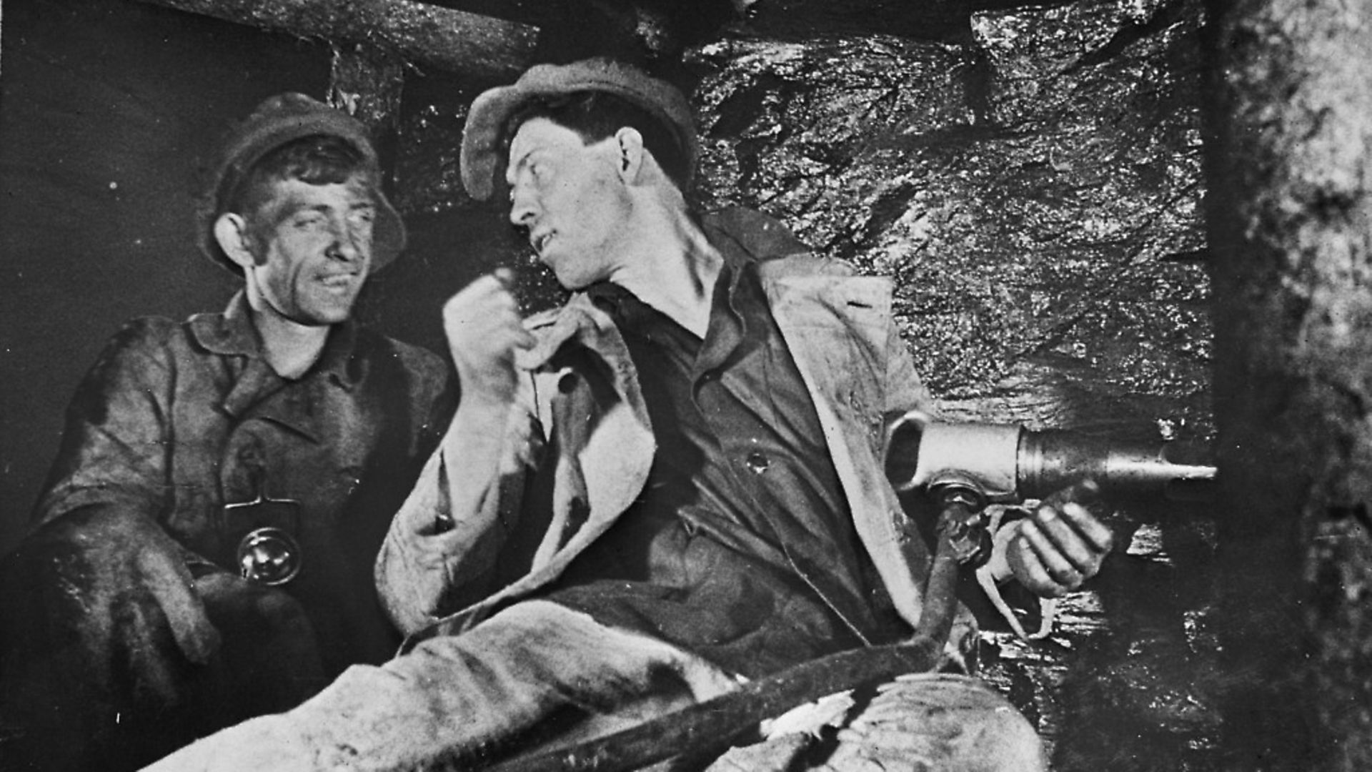 Alexey Stakhanov (right) explains his system to a fellow miner in the USSR between 1935 and 1945. Picture: Getty Images - Credit: Archant