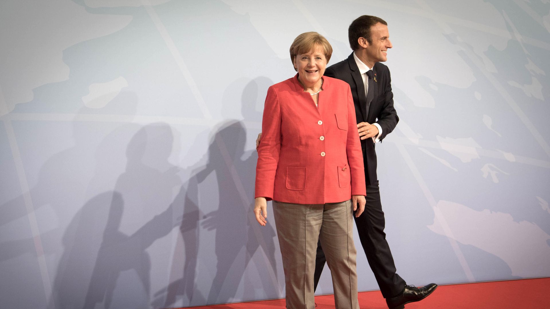 German Chancellor Angela Merkel and French President Emmanuel Macron - Credit: PA