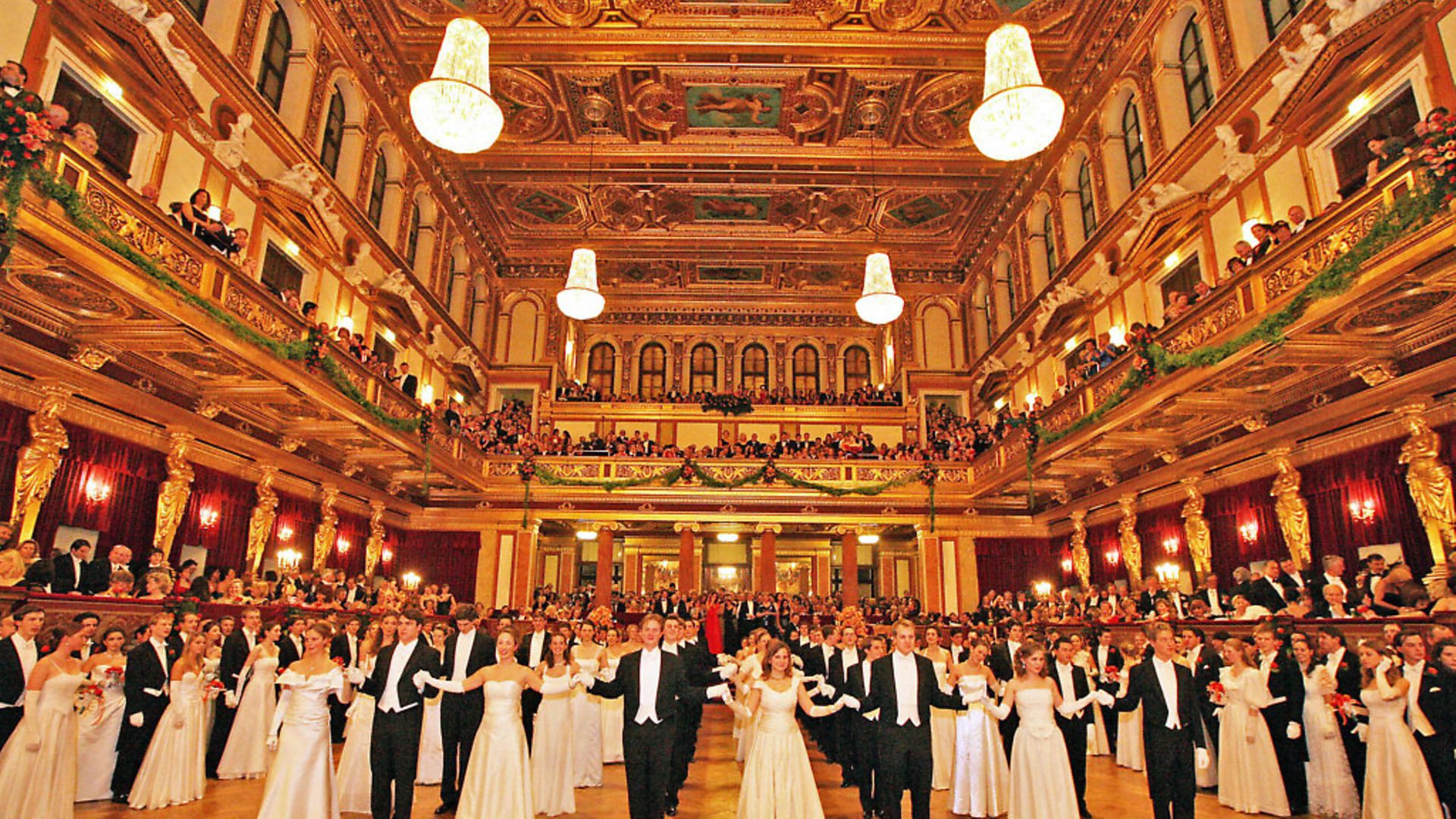 Young couples wait to dance in the "Golden Auditorium" of the Musikverein on January 22, 2009 during the opening of the Philharmonic Ball, one of the cities fanciest balls of the season, performed by the Vienna Philharmonic Orchestra, in Vienna.     AFP PHOTO/ DIETER NAGL (Photo credit should read DIETER NAGL/AFP via Getty Images) - Credit: AFP via Getty Images