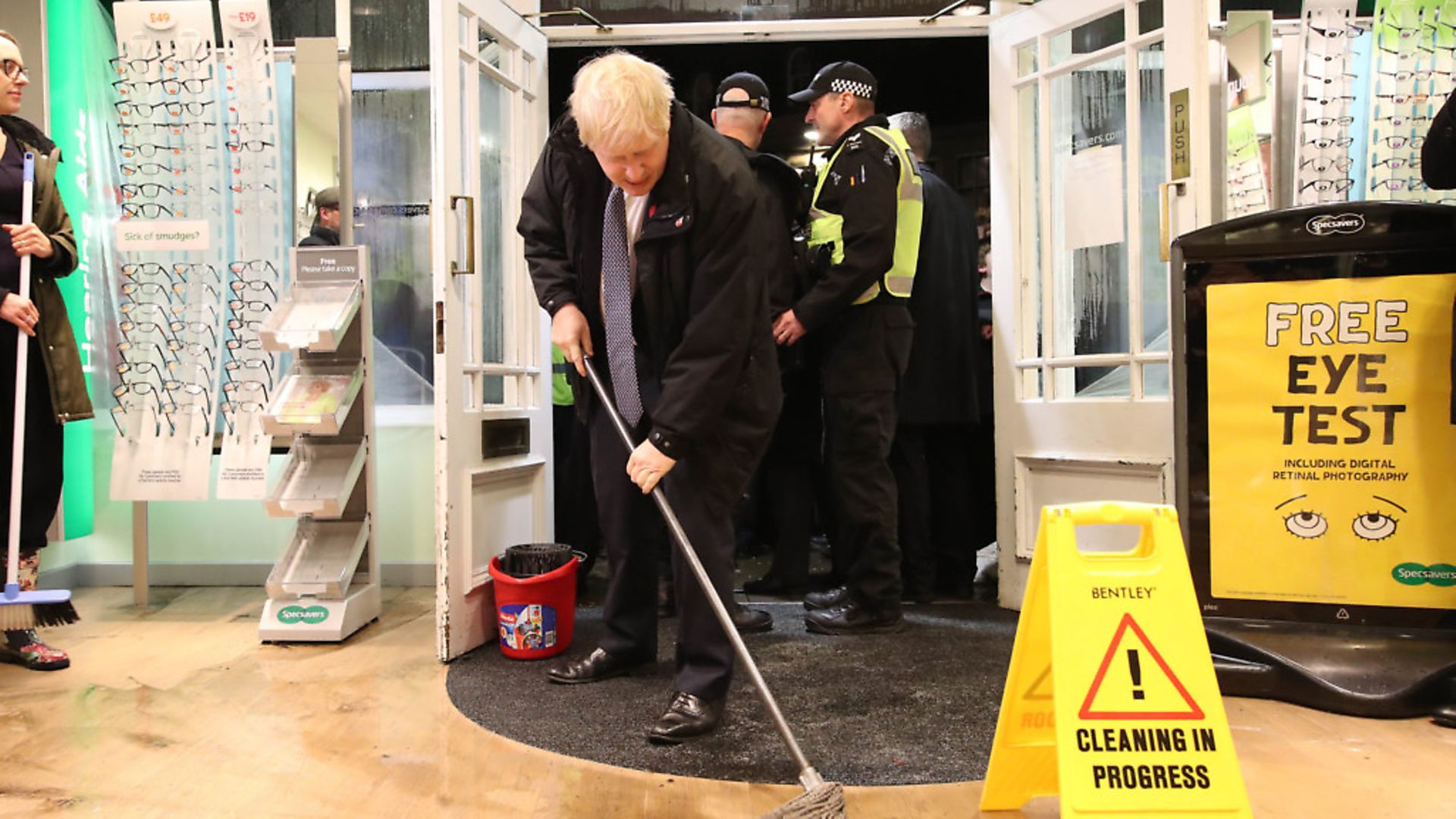 Prime Minister Boris Johnson was mocked for his poor mopping skills as he visited flood-hit Matlock. Picture: Danny Lawson/PA Wire/PA Images - Credit: PA Wire/PA Images