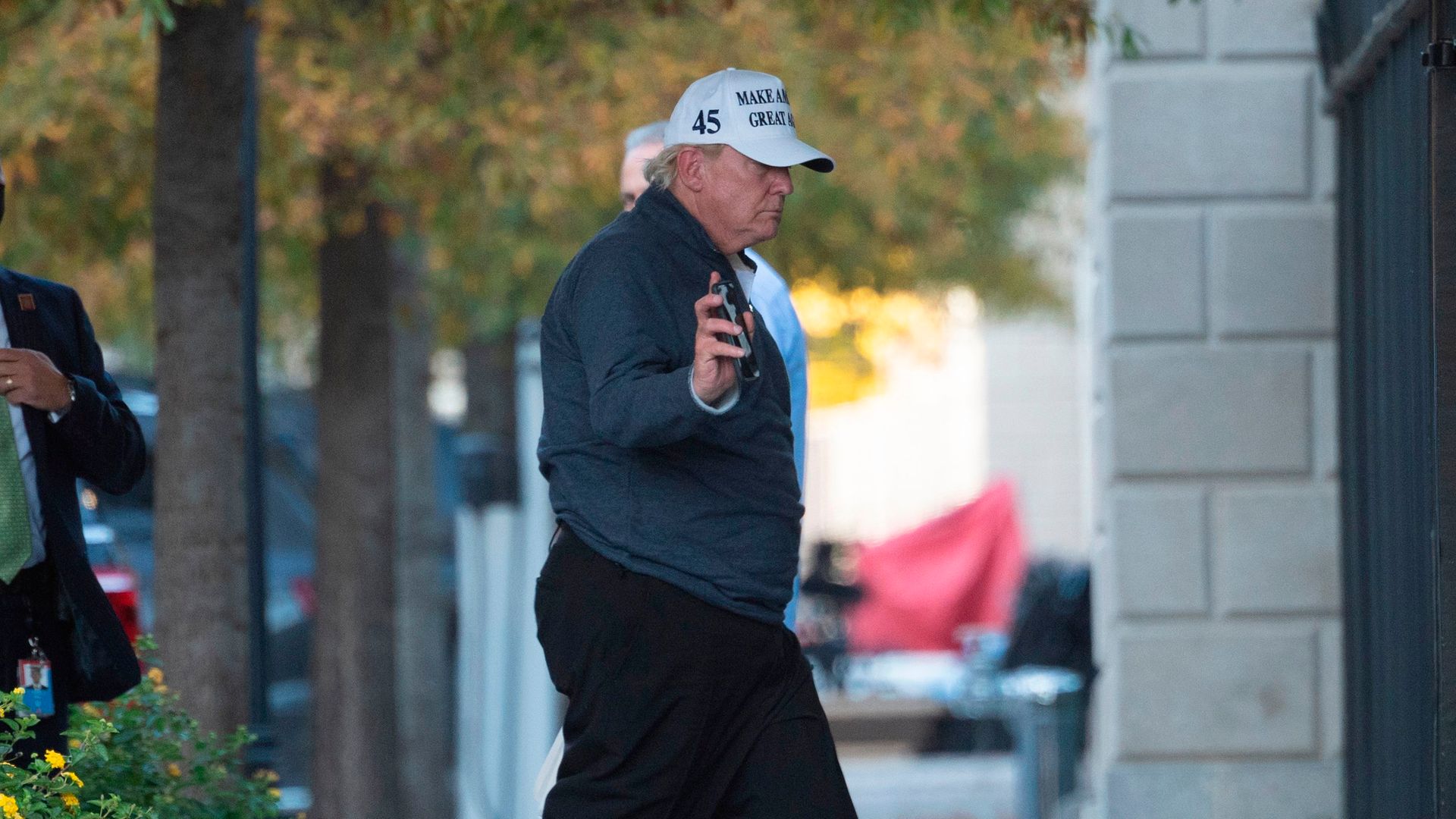 Donald Trump returns to the White House from playing golf in Washington, DC, after Joe Biden was declared the winner of the presidential election - Credit: AFP via Getty Images