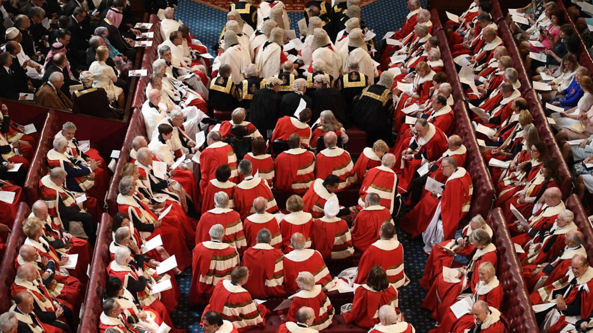 Peers take their seats in the House of Lords before the state opening of parliament. The Upper House is one area of British life in need of an overhaul, says Ian Dunt - Credit: Getty Images