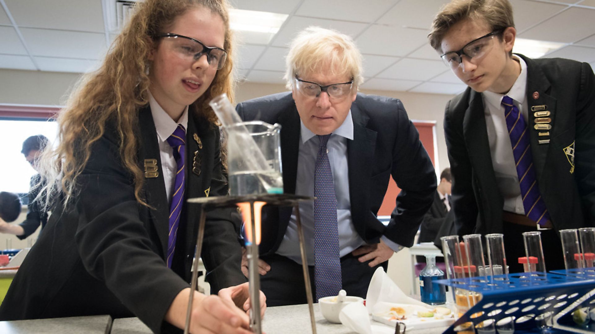 Boris Johnson helps with a science demonstration whilst on the General Election campaign trail. Photo: Stefan Rousseau/PA Wire. - Credit: PA