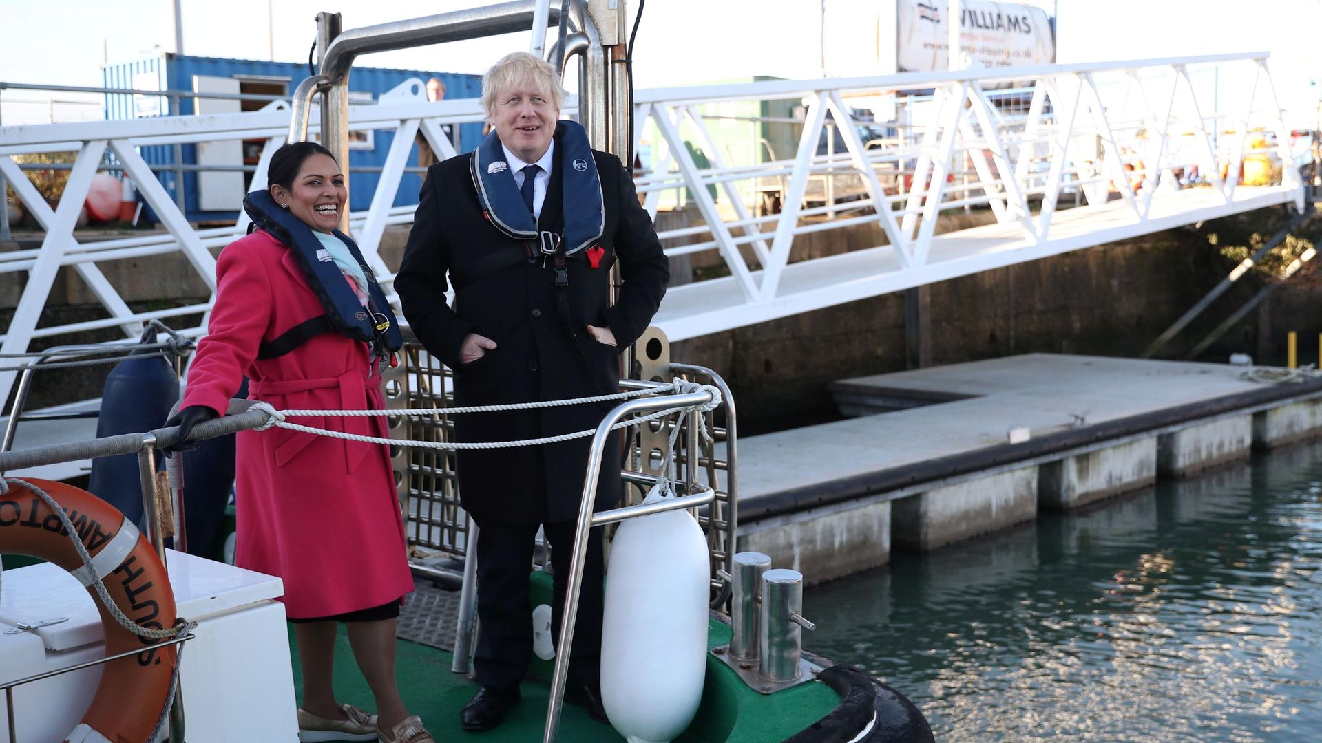 Boris Johnson and Priti Patel on a boat at Southampton docks during the 2019 election campaign - Credit: POOL/AFP via Getty Images