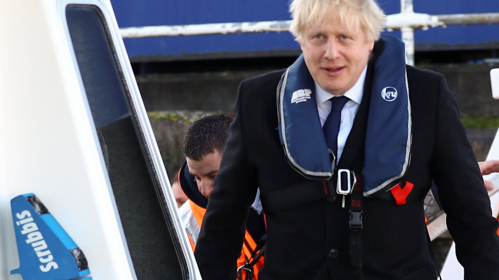 Prime Minister Boris Johnson boards a security vessel at the Port of Southampton. Picture: Getty Images - Credit: Getty Images