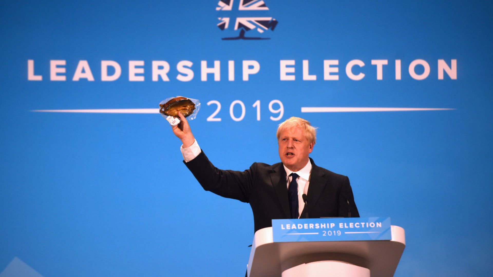 Conservative Party leadership candidate Boris Johnson brandishes a kipper during the final Tory leadership hustings - Credit: PA Wire/PA Images