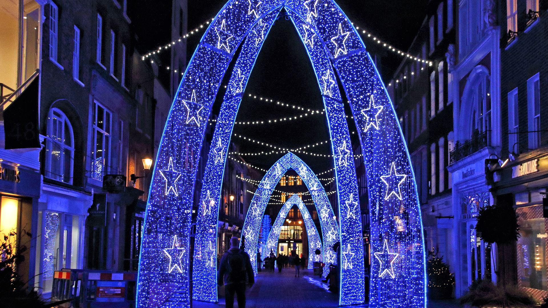 A display of Christmas lights in an almost deserted South Molton Street, in London - Credit: SOPA Images/LightRocket via Gett