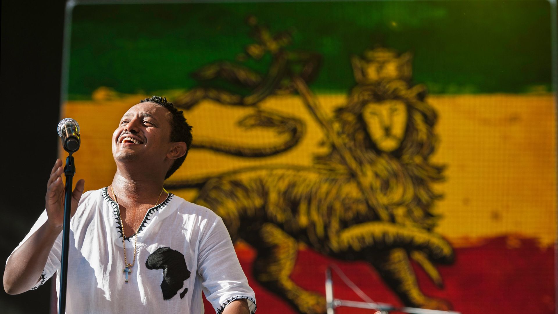 Teddy Afro performs on stage at a concert in Central Park, New York, in 2014 - Credit: Getty Images