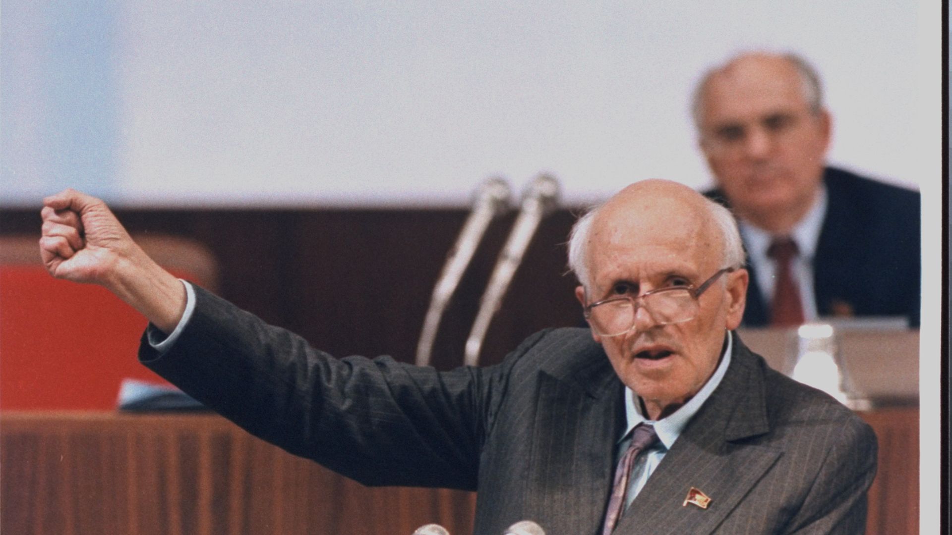 Andrei Sakharov, a few days before his death, during a session of the Congress of People's Deputies, with Mikhail Gorbachev listening behind - Credit: The LIFE Images Collection via G