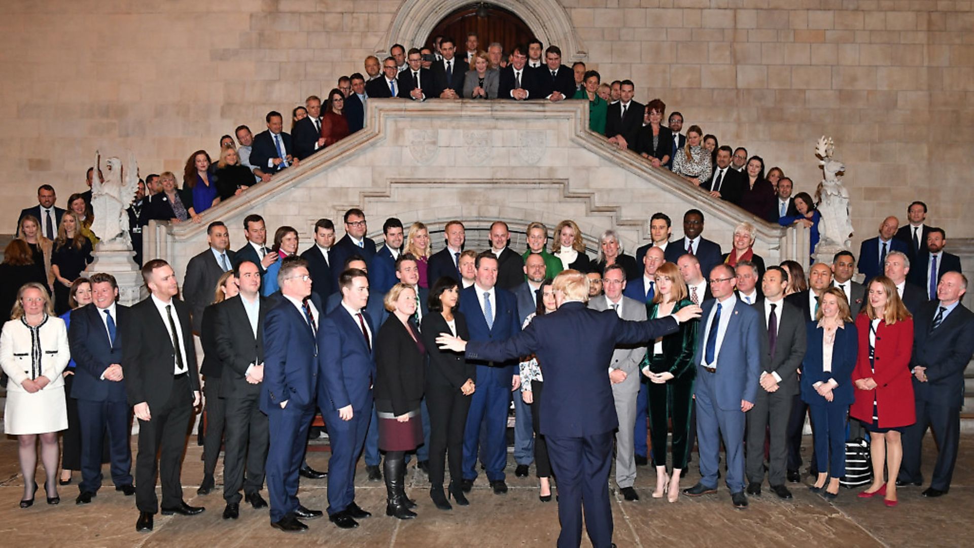 Boris Johnson alongside the newly elected Conservative MPs at the Houses of Parliament in Westminster. Photograph: Leon Neal/PA Wire. - Credit: PA
