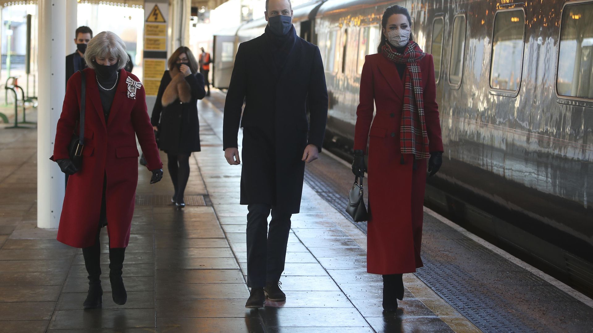 The Duke and Duchess of Cambridge walk with Lord Lieutenant of South Glamorgan Morfudd Meredith (left) as they arrive at Cardiff Central train station on the final day of a three-day tour across the country. - Credit: PA