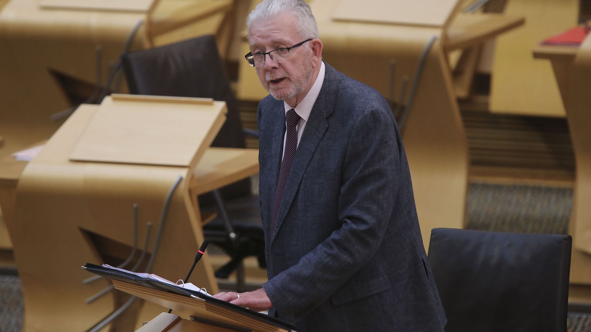 Cabinet Secretary for Government Business and Constitutional Relations Michael Russell giving a ministerial statement at the Scottish Parliament at Holyrood, Edinburgh. - Credit: PA