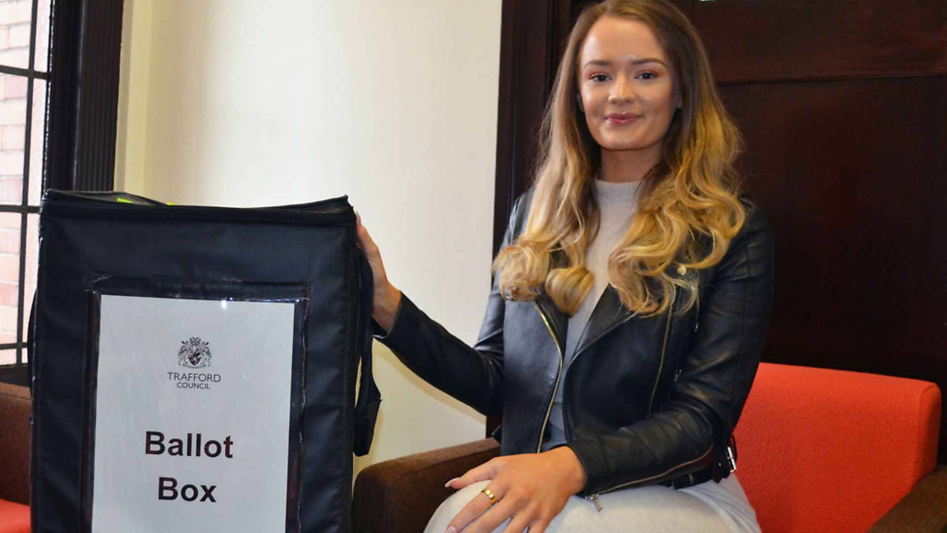 Charlotte, 22, reunited with her wedding ring and the ballot box after it slipped off her finger while casting her vote in Thursdays general election. Photograph: Trafford Council /PA Wire

. - Credit: PA