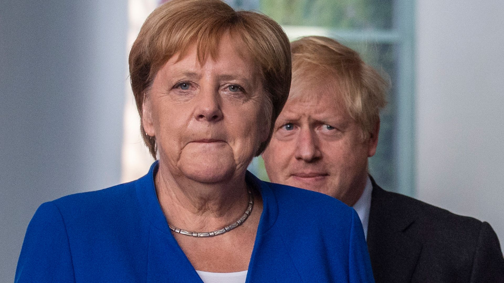 Angela Merkel and Boris Johnson in 2019 in Berlin - Credit: AFP via Getty Images