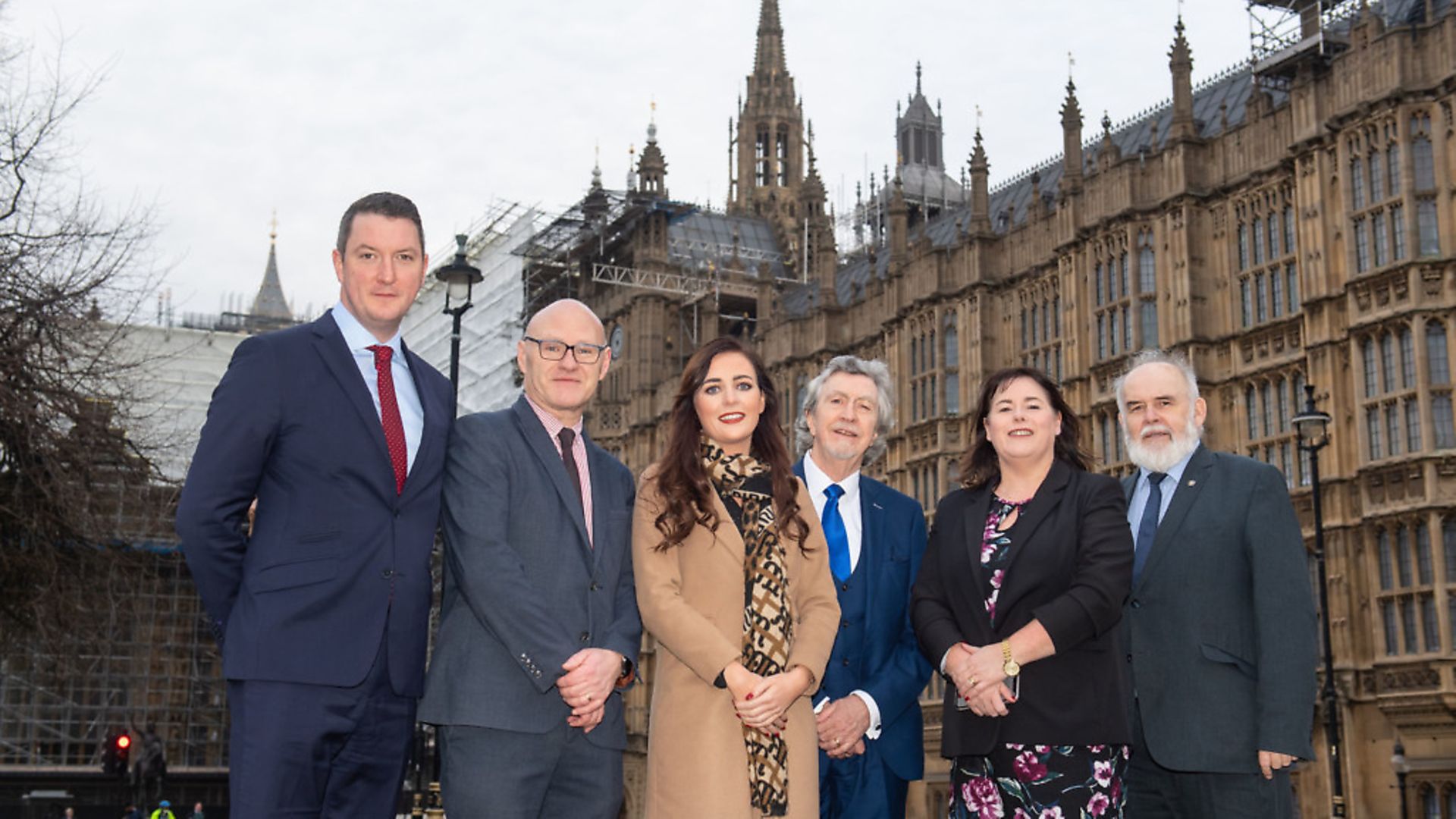 Recently elected Sinn F�in MPs (left to right) John Finucane, Paul Maskey, Orfhlaith Begley, Mickey Brady, Michelle Gildernew, and Francie Molloy, outside the Houses of Parliament. Photograph: Dominic Lipinski/PA Wire. - Credit: PA