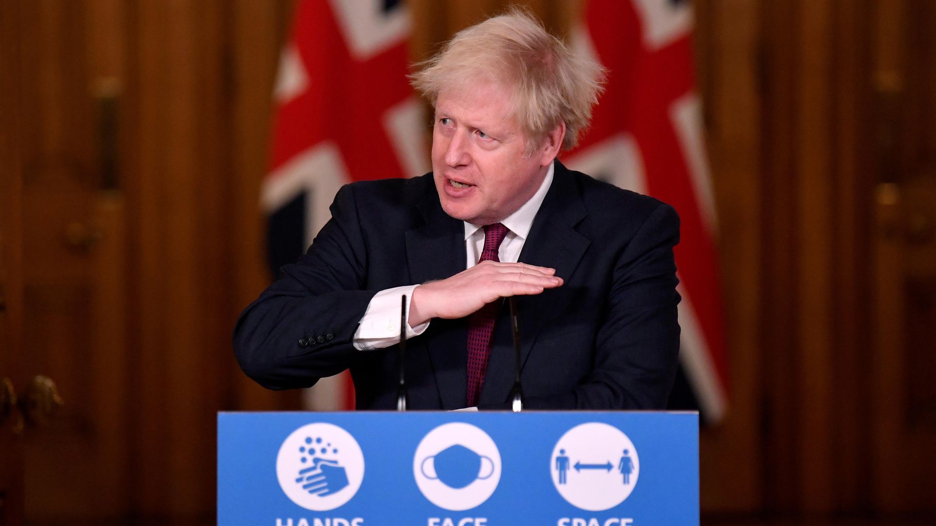 Prime Minister Boris Johnson speaks during a news conference in response to the ongoing situation with the Covid-19 pandemic, at 10 Downing Street, London. - Credit: PA