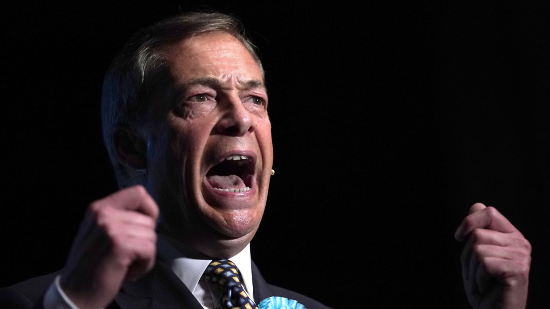 Brexit Party's Nigel Farage addresses supporters during a rally. - Credit: Getty Images