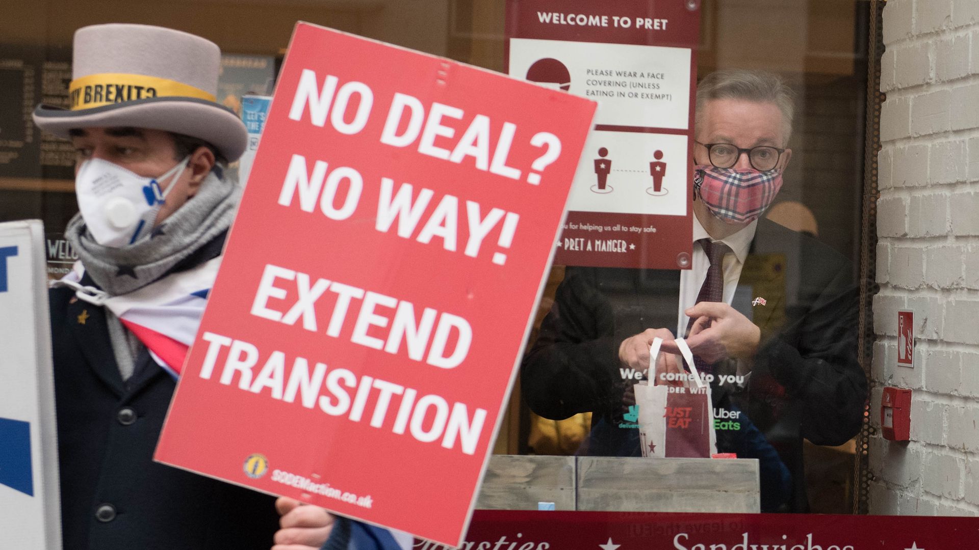 Chancellor of the Duchy of Lancaster, Michael Gove buys coffee from a cafe in Westminster, central London as ongoing talks to strike a post-Brexit trade deal take place this morning. - Credit: PA