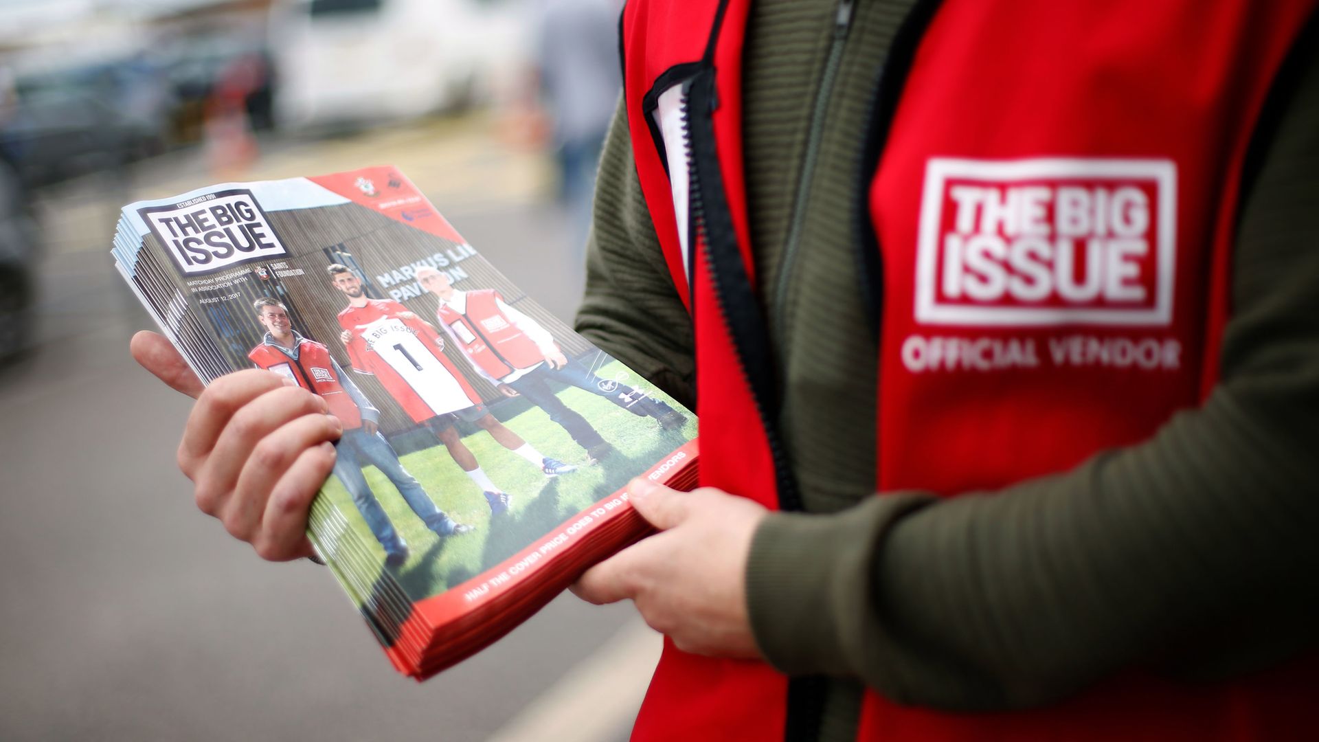 A vendor selling The Big Issue magazine - Credit: PA