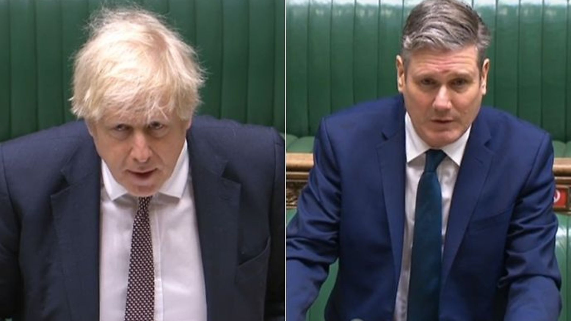 Boris Johnson (L) and Sir Keir Starmer during a session of Prime Minister's Questions (PMQs) - Credit: Parliamentlive.tv