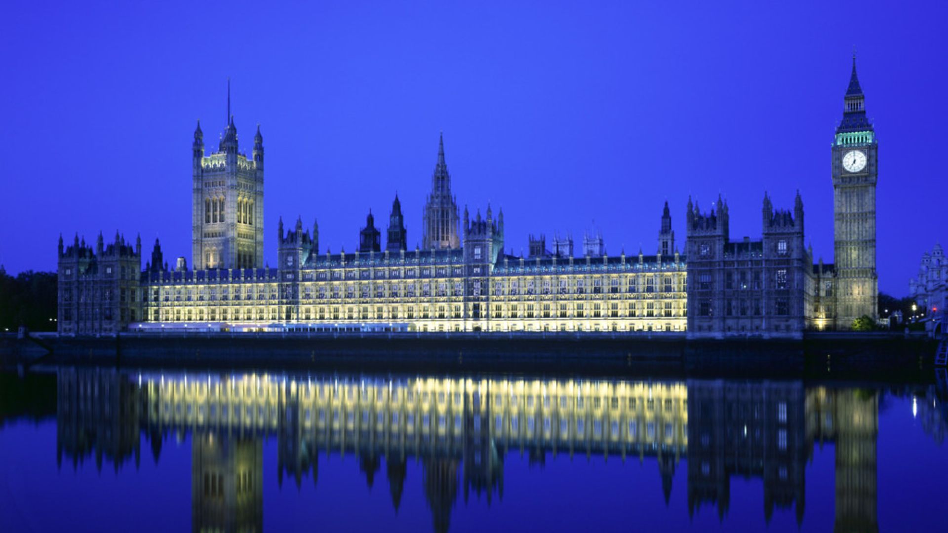 The Palace of Westminster at night - Credit: Getty Images