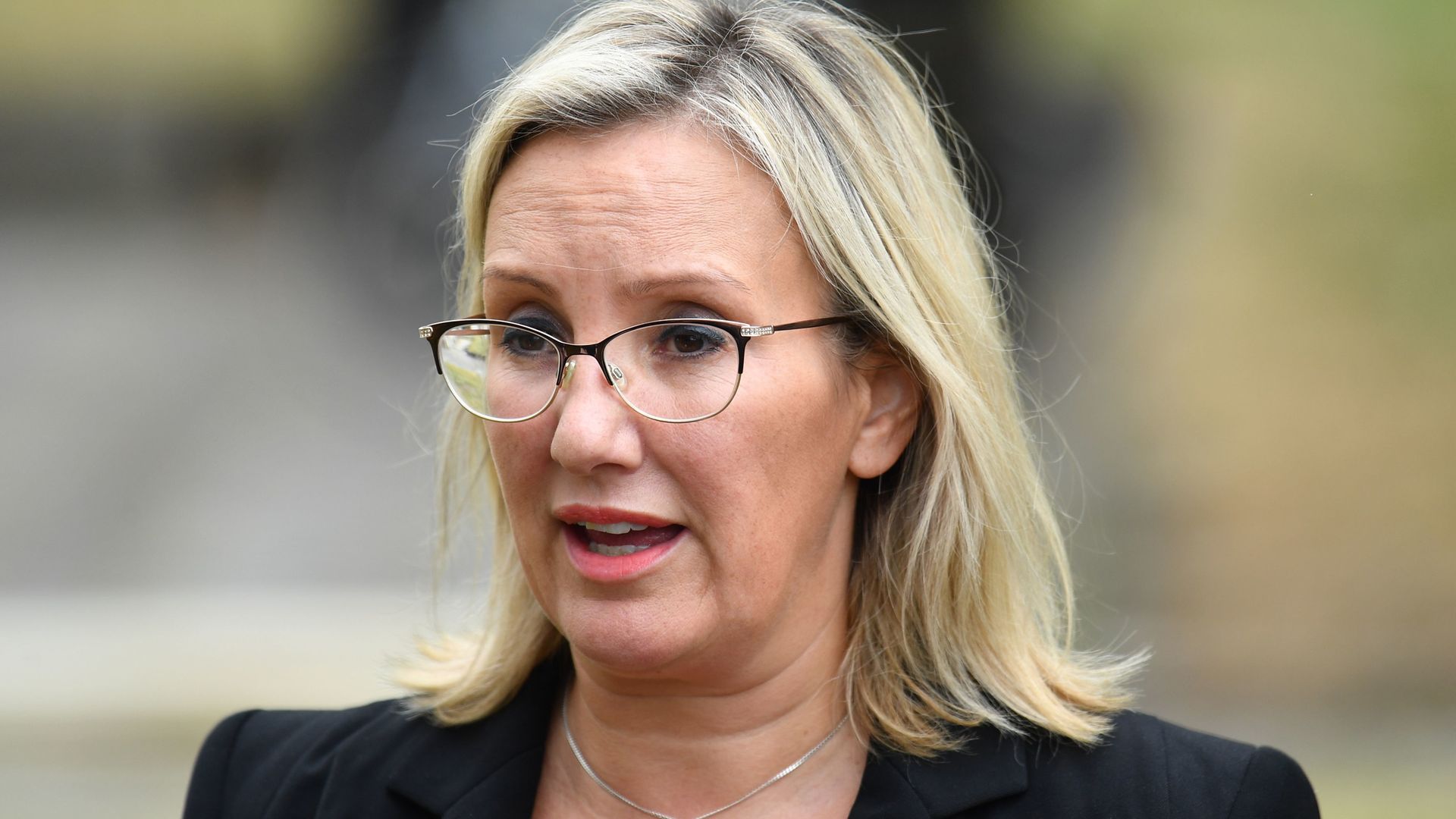 MP for Gosport, Caroline Dinenage, speaks to reporters outside Portsmouth Cathedral - Credit: PA