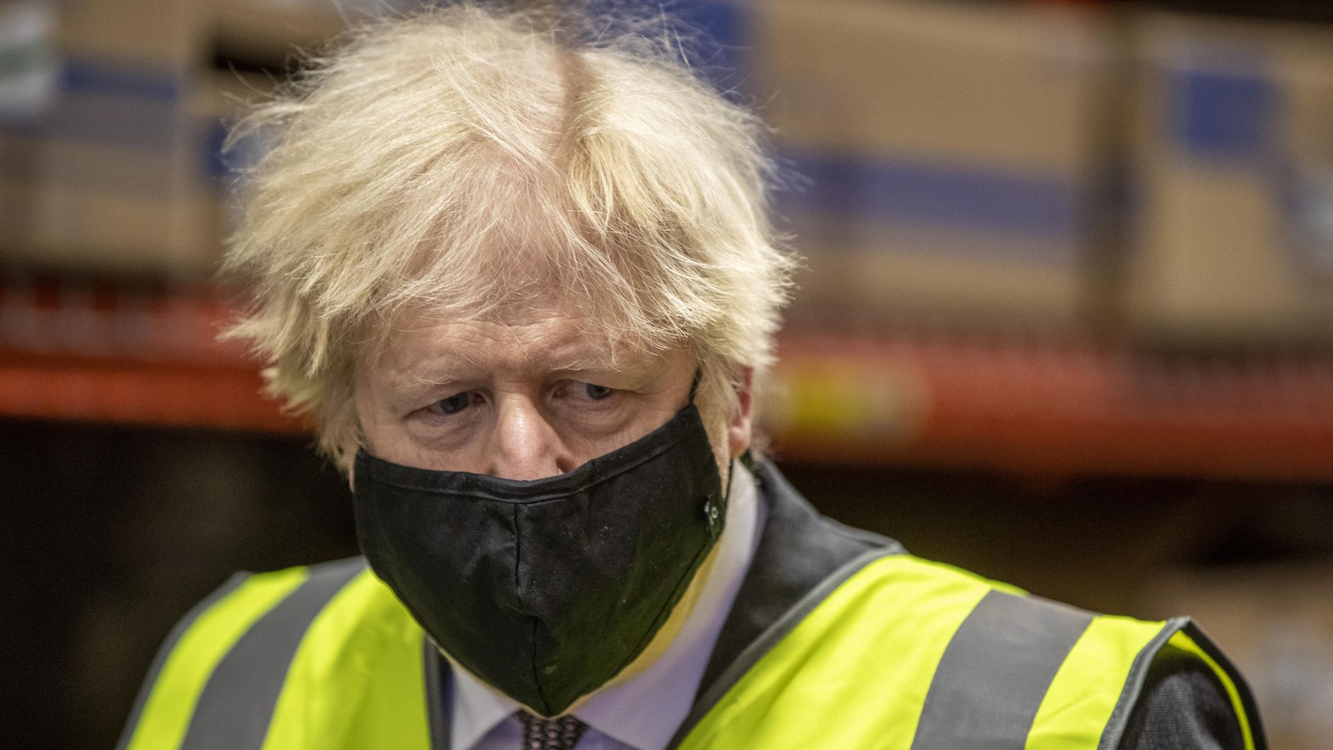 Prime Minister Boris Johnson, during a tour of the manufacturing facility for the Oxford/Astrazeneca vaccine at Oxford Biomedica in Oxfordshire - Credit: PA