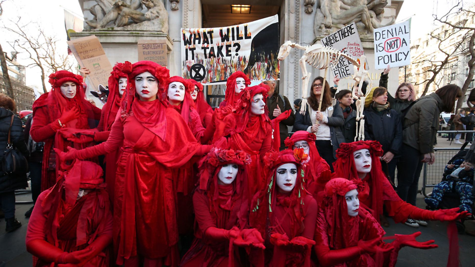 The Red Rebels join climate change protesters outside the Australian Embassy in London, where Extinction Rebellion are staging a protest against the Australian government's response to the wildfires in Australia. Photograph: Jonathan Brady/PA Wire. - Credit: PA