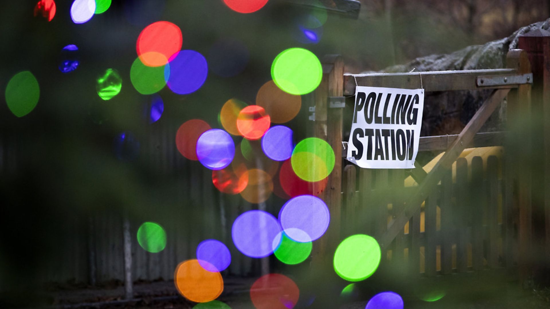 Lights on a Christmas tree next to a polling station in Laggan in the Cairngorms. Photograph: Jane Barlow/PA. - Credit: PA Wire/PA Images