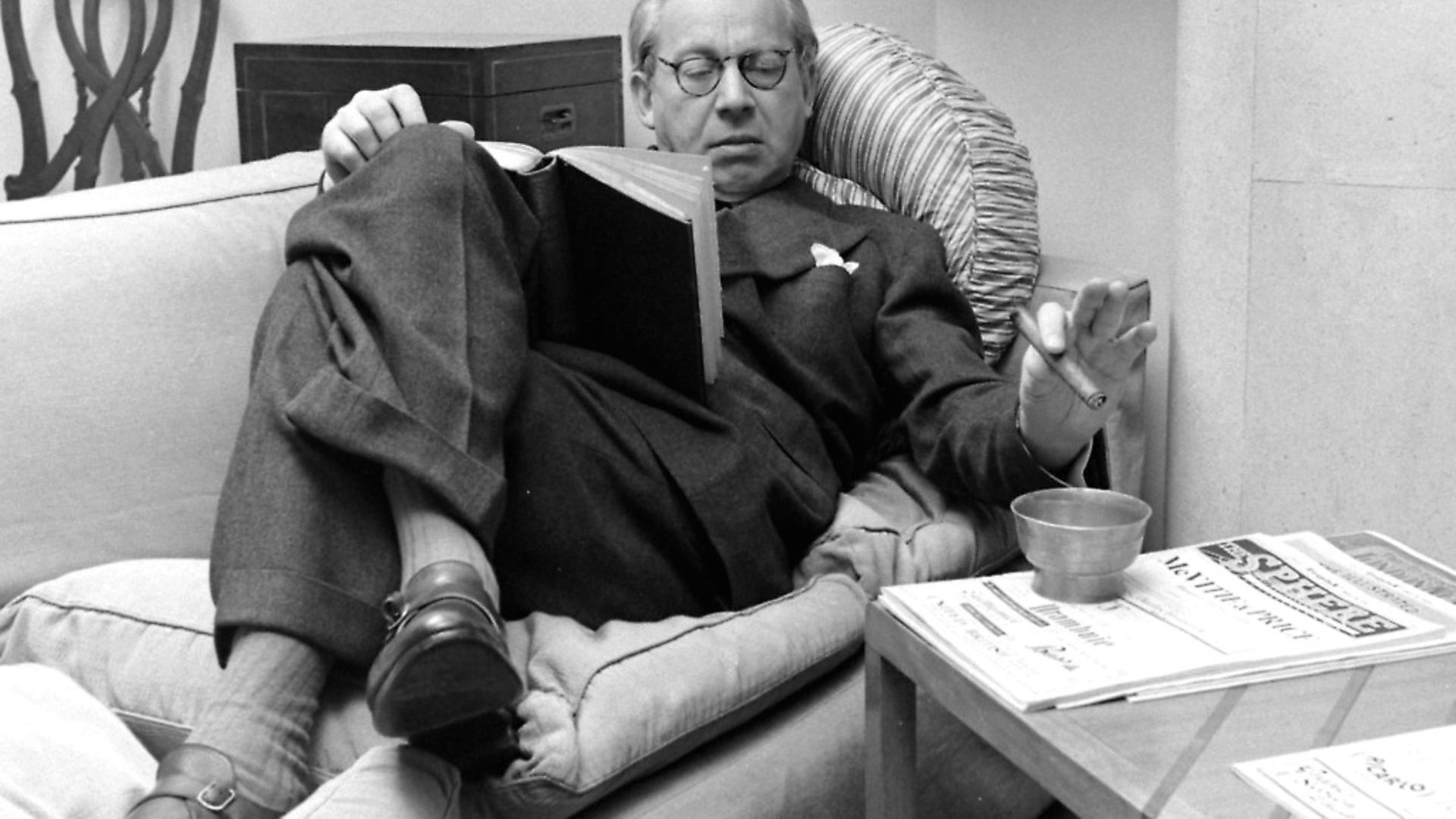 Sir Alexander Korda reading a book on a couch, United Kingdom, 1948 (Photo by Nat Farbman/The LIFE Picture Collection via Getty Images) - Credit: The LIFE Picture Collection via