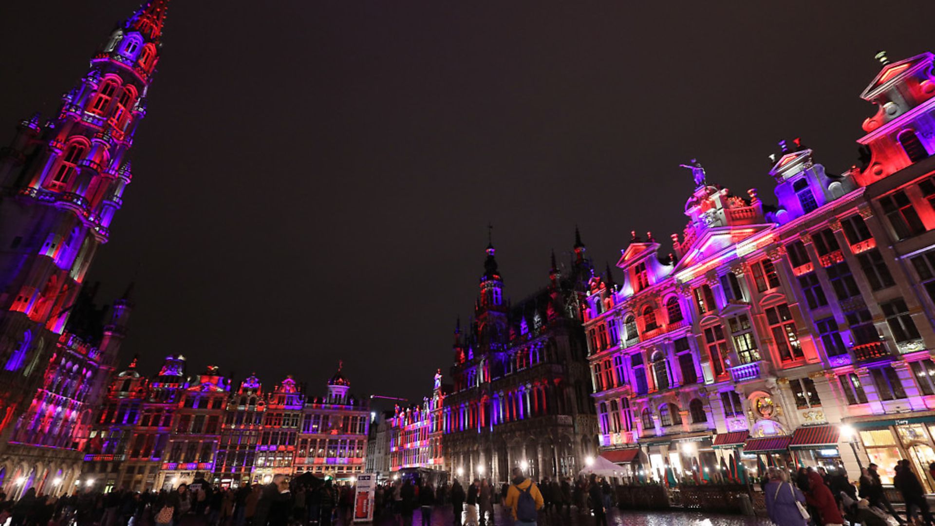 Grand Place in Brussels, Belgium, is lit up in red, white and blue during a celebration and farewell to the UK on the eve of the UK leaving the European Union. Photograph: Yui Mok/PA Wire. - Credit: PA