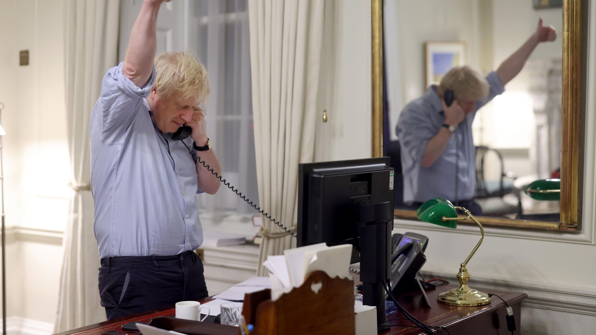 Prime minister Boris Johnson speaks to the president of the United States Joe Biden from his office inside No10 Downing Street - Credit: Andrew Parsons / No10 Downing St