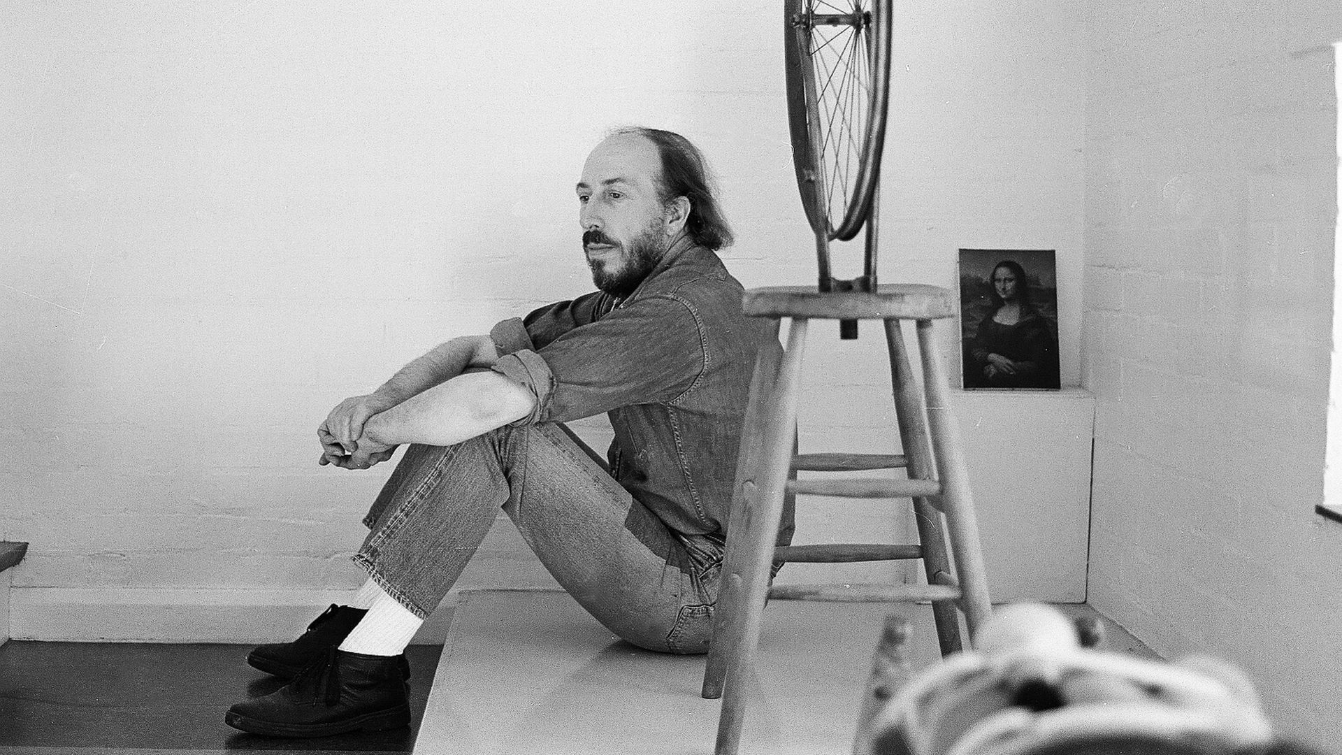 Richard Hamilton seated in his studio at 25 Hurst Avenue in Highgate in London circa 1970 - Credit: Redferns