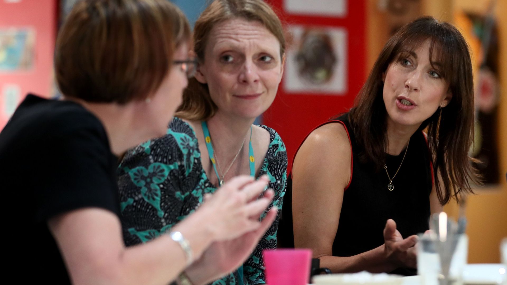 Samantha Cameron (right) hosts a coffee morning to celebrate the work of charity KIDS and the services that they deliver to disabled children, young people and their families, at Hackney Adventure Playground in London. - Credit: PA