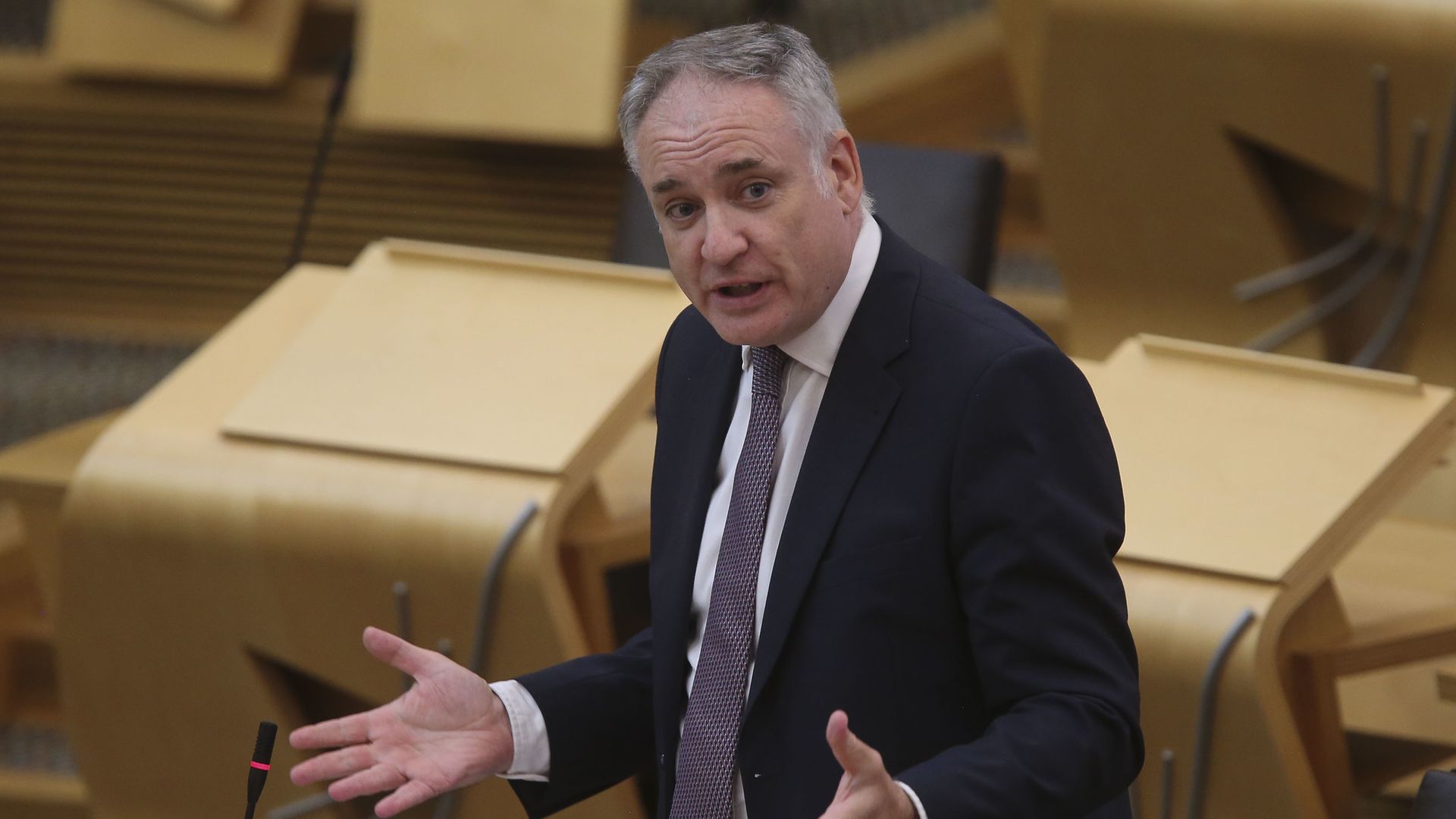 Minister for further education, higher education and science, Richard Lochhead MSP during Topical Questions at the Scottish Parliament at Holyrood, Edinburgh. - Credit: PA