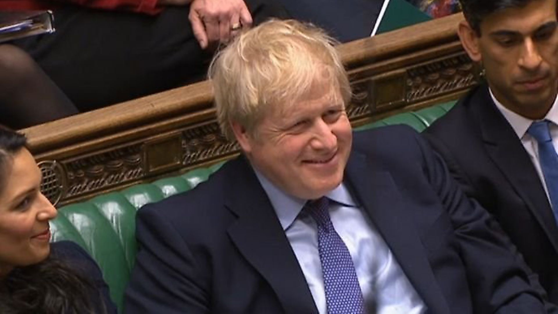 Boris Johnson with Priti Patel and Rishi Sunak in the House of Commons. Photograph: Parliament TV. - Credit: Archant