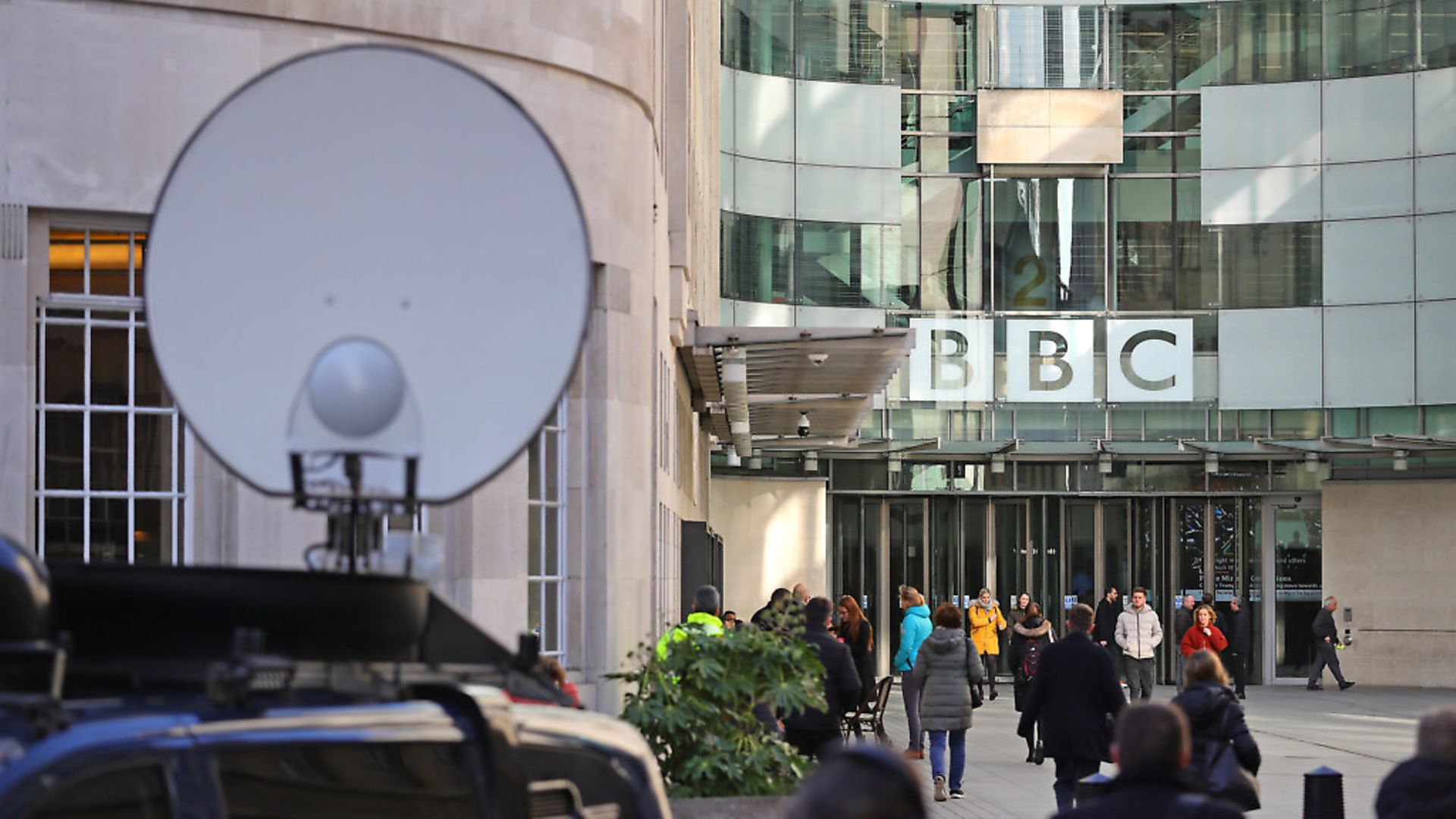 Media trucks outside BBC Broadcasting House in London. Photograph: Aaron Chown/PA. - Credit: PA
