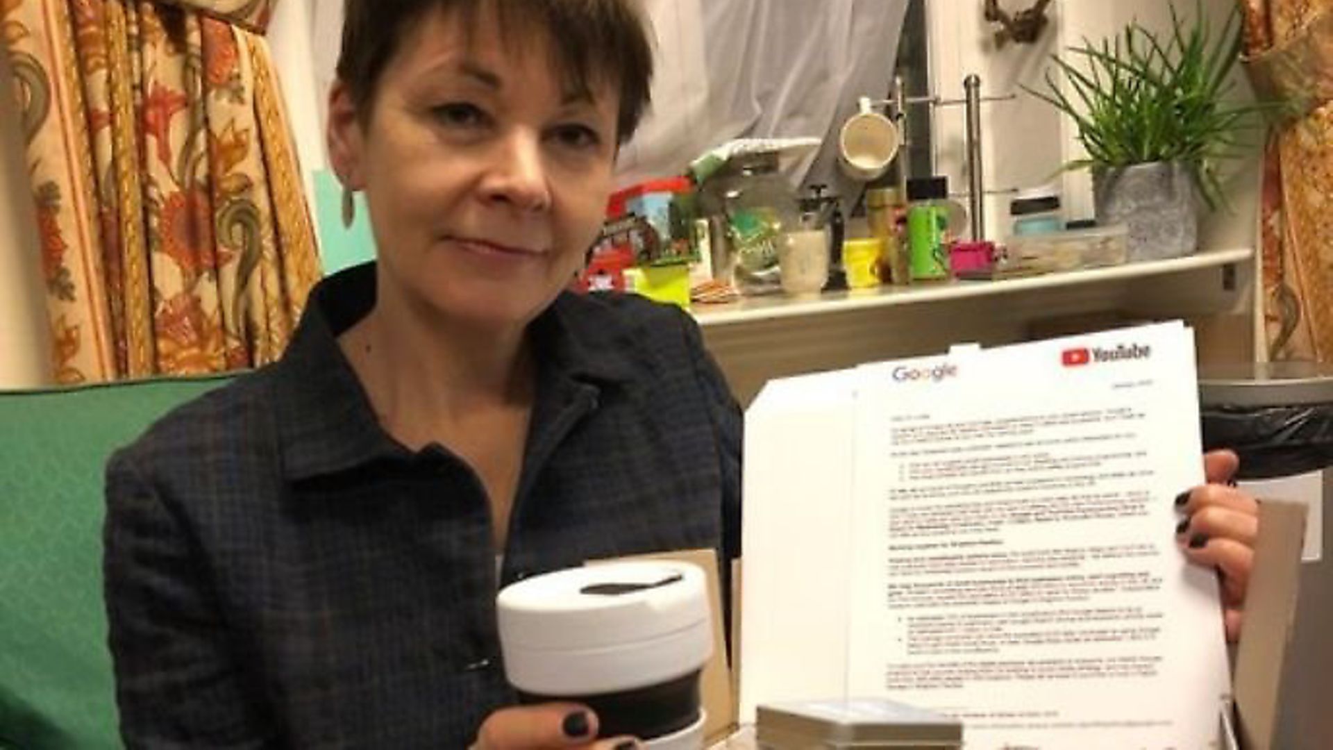 Caroline Lucas holds a package from Google. Photograph: Twitter. - Credit: Archant