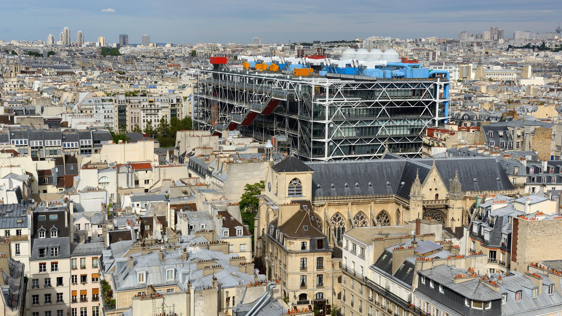 A view of Paris, including the Pompidou Centre in the foreground, from the Tour Saint-Jacques - Credit: Corbis via Getty Images