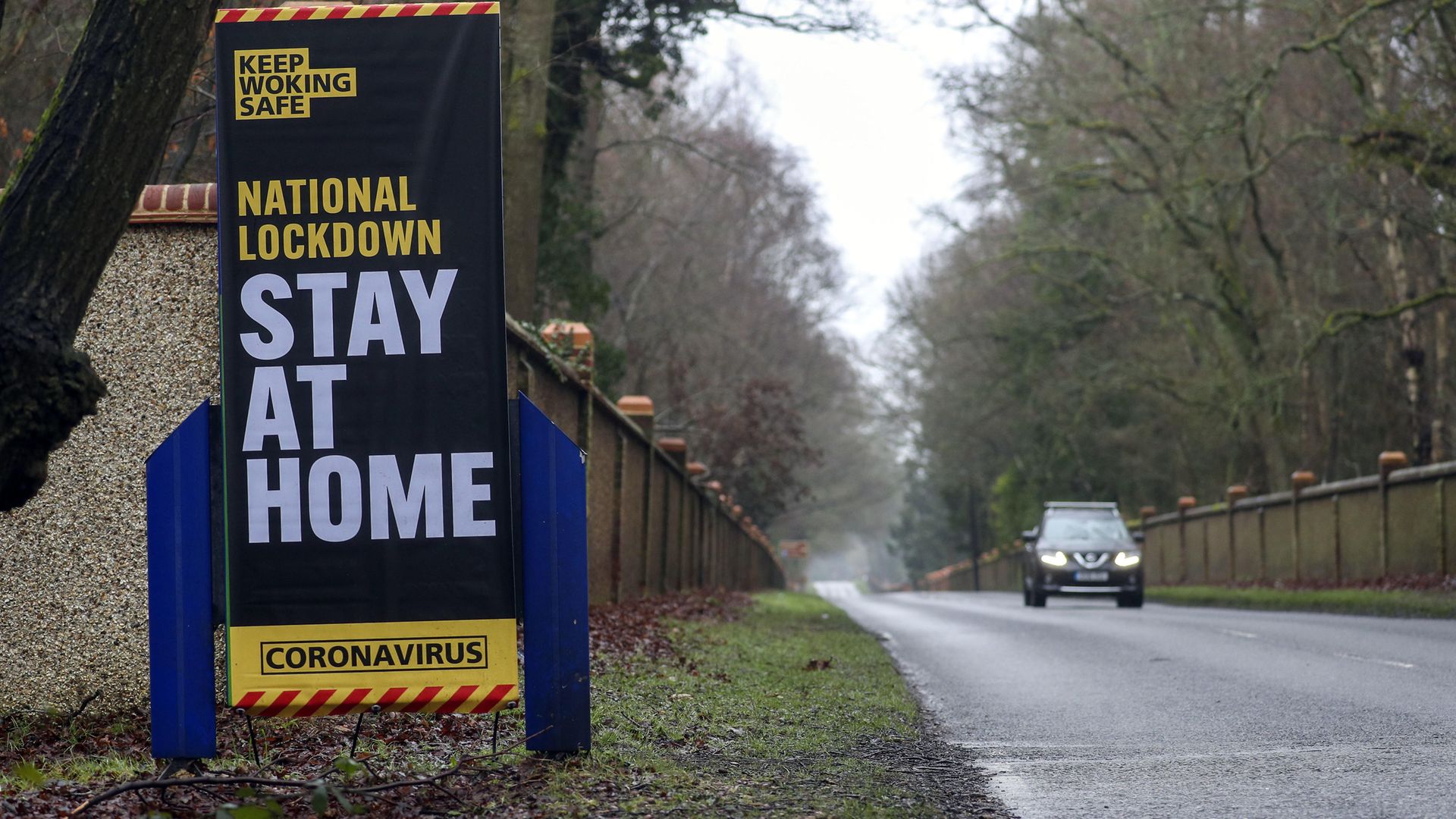 A coronavirus information sign in Brookwood, Surrey, during England's third national lockdown to curb the spread of coronavirus - Credit: PA