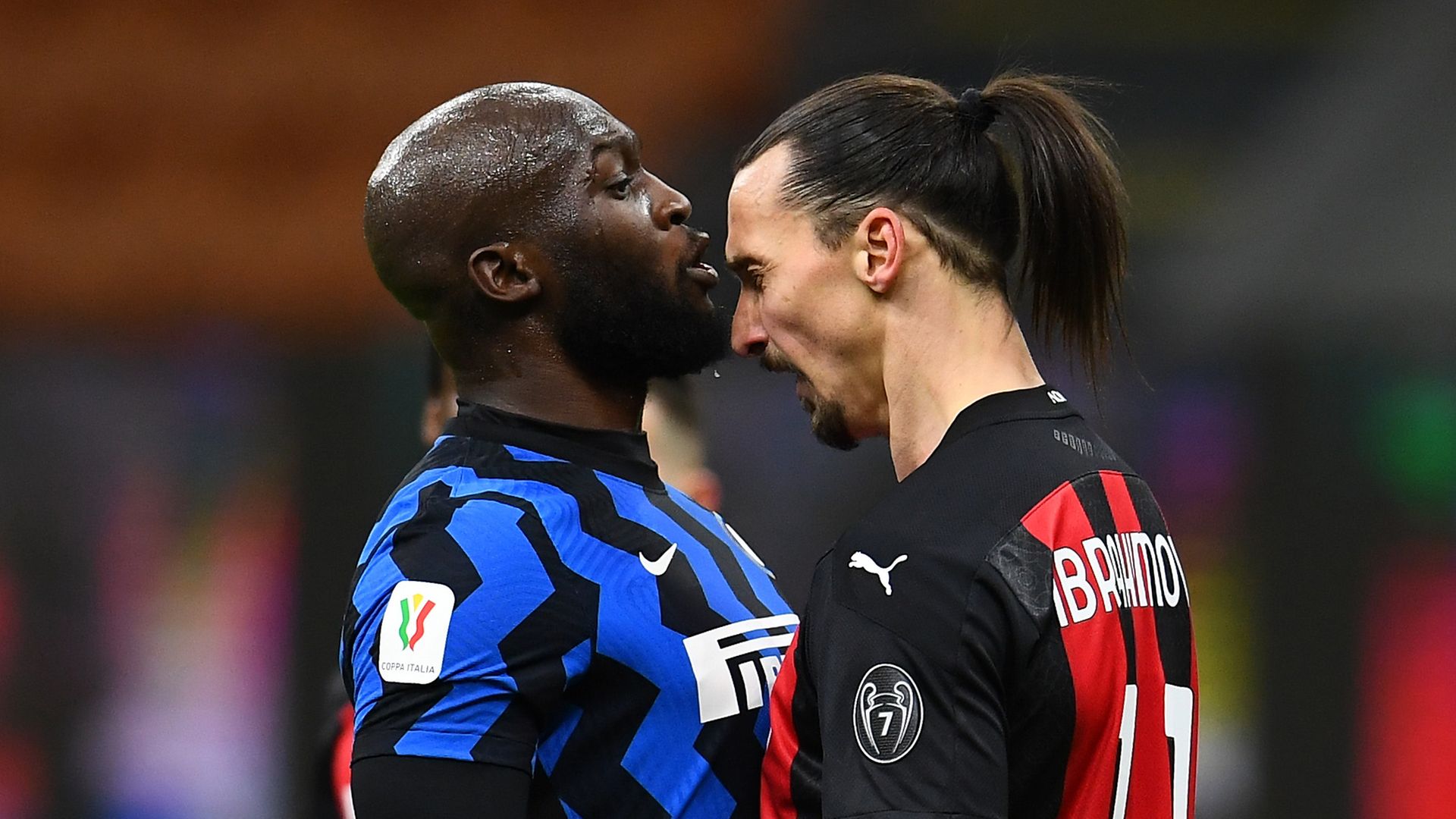 Romelu Lukaku of Internazionale clashes with Zlatan Ibrahimovic of AC Milan during the Coppa Italia match between their sides at the Stadio Giuseppe Meazza - Credit: Inter via Getty Images