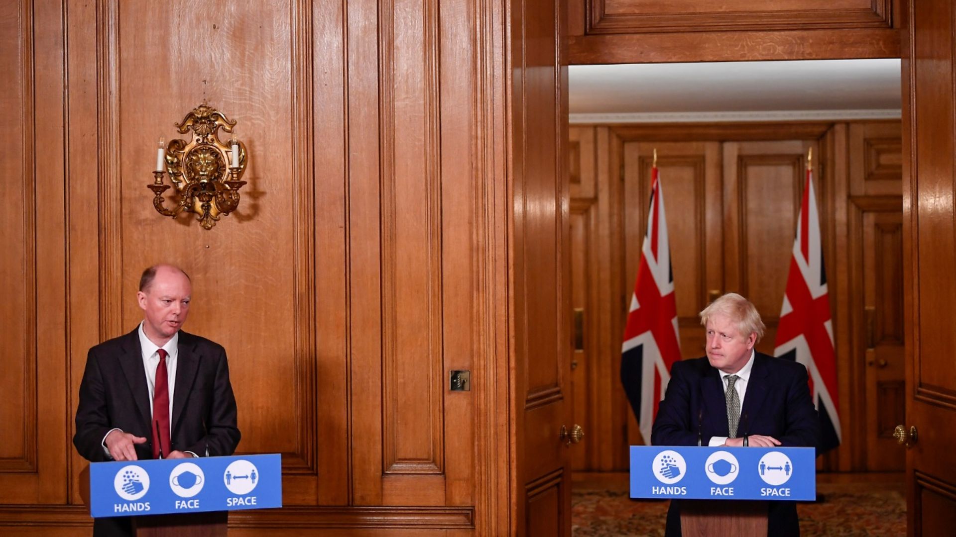 Chris Whitty and Boris Johnson at a Downing Street press conference - Credit: PA Wire/PA Images