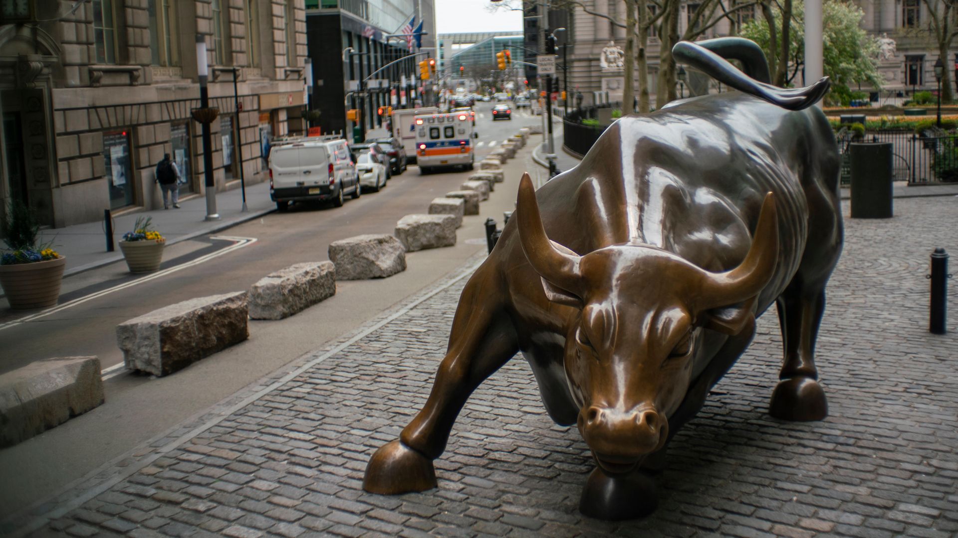The Charging Bull is seen on an empty Wall Street in New York City. United States - Credit: VIEWpress via Getty Images