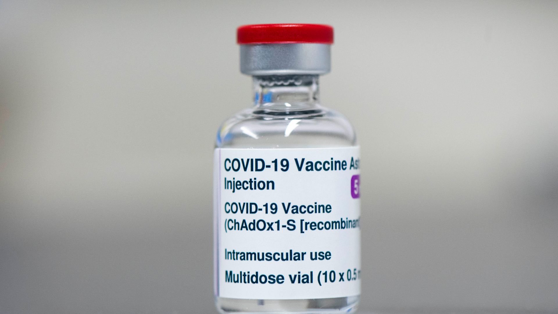 A close-up of a vaccine vial which contains 10 doses of the Oxford-AstraZeneca Covid-19 vaccine which has caused such controversy in Europe - Credit: Getty Images