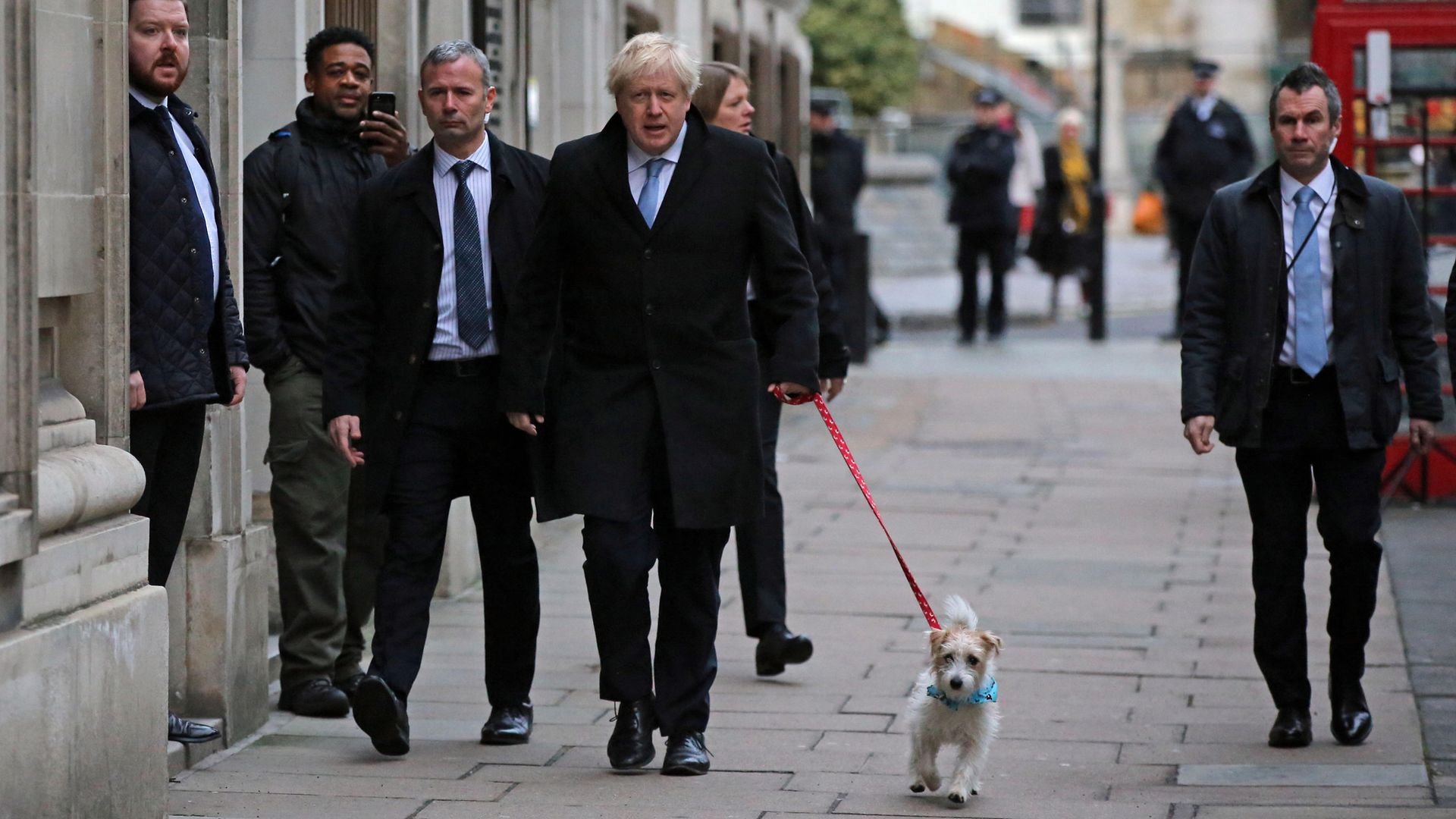 Prime Minister Boris Johnson arrives with his dog Dilyn to cast his vote in the 2019 General Election at Methodist Central Hall, London - Credit: PA