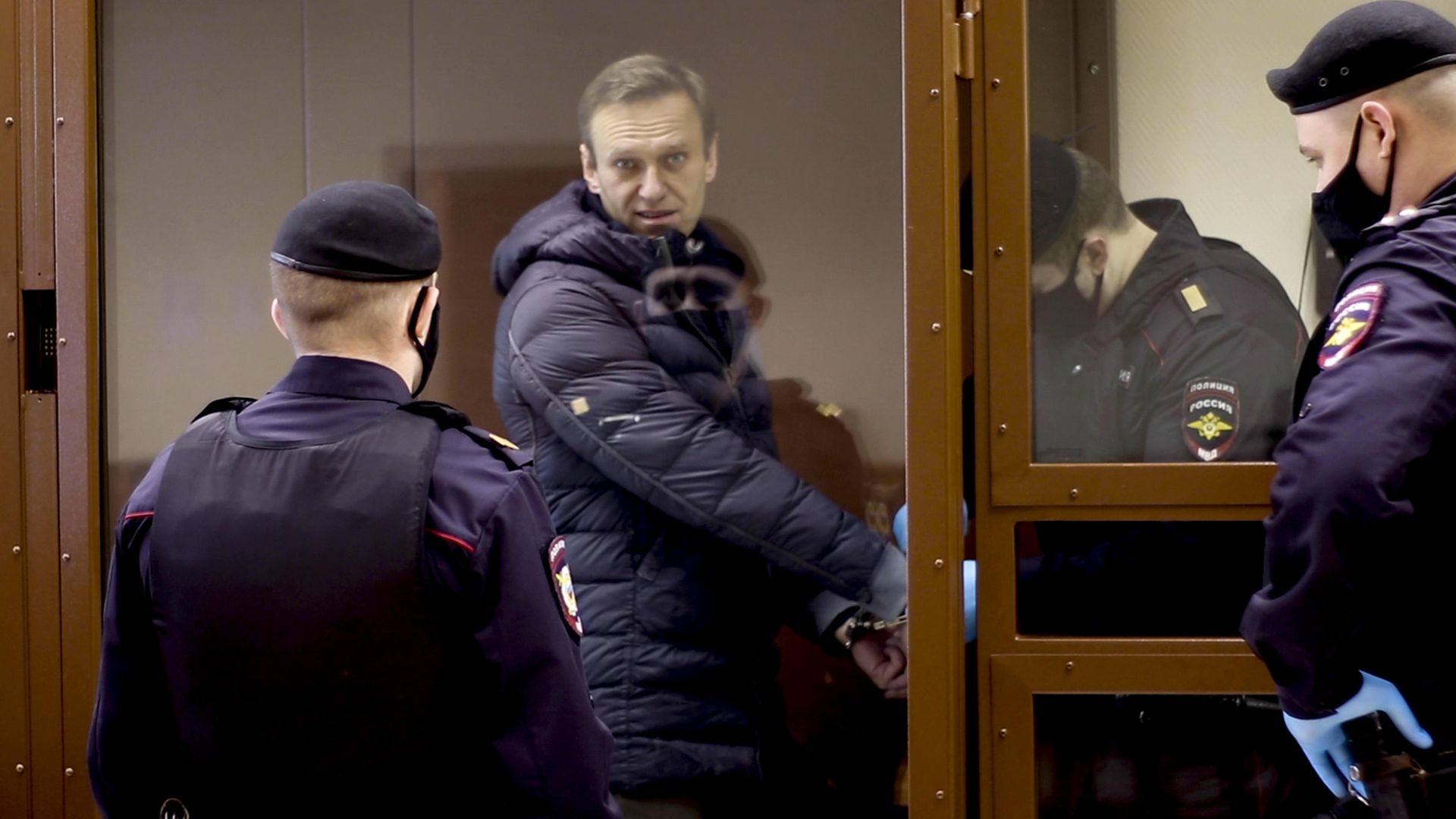 TRAPPED: Russian opposition Alexei Navalny appears in court in Moscow - Credit: Anadolu Agency via Getty Images