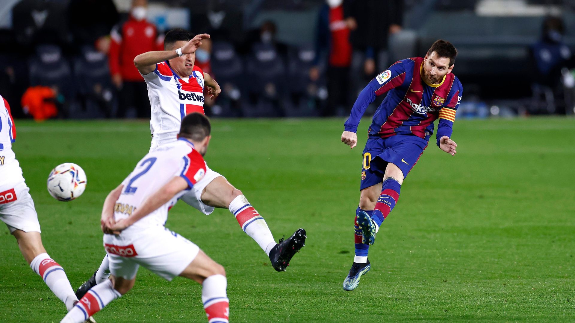 Lionel Messi of FC Barcelona scores at Camp Nou (Photo by Eric Alonso/Getty Images) - Credit: Getty Images