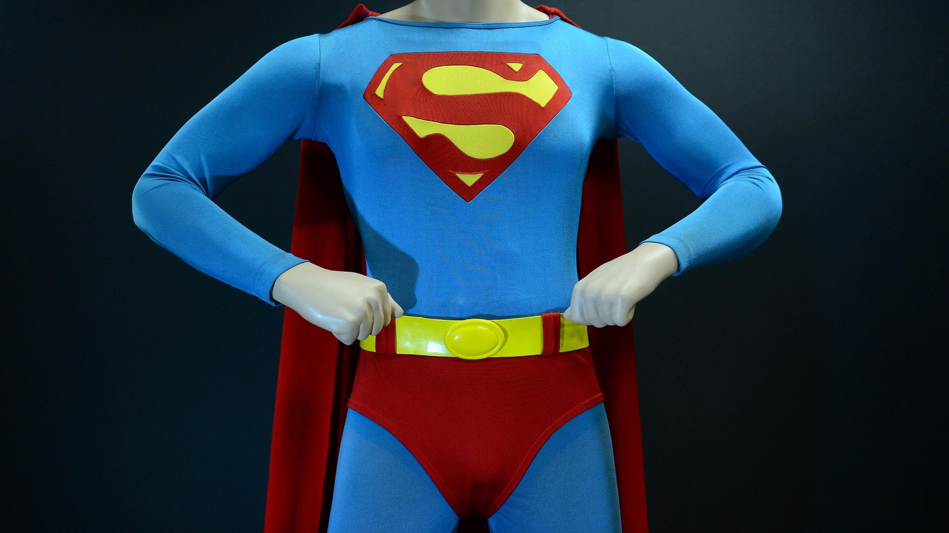 The Superman costume that was worn by Christopher Reeve in Superman: The Movie - Credit: AFP via Getty Images